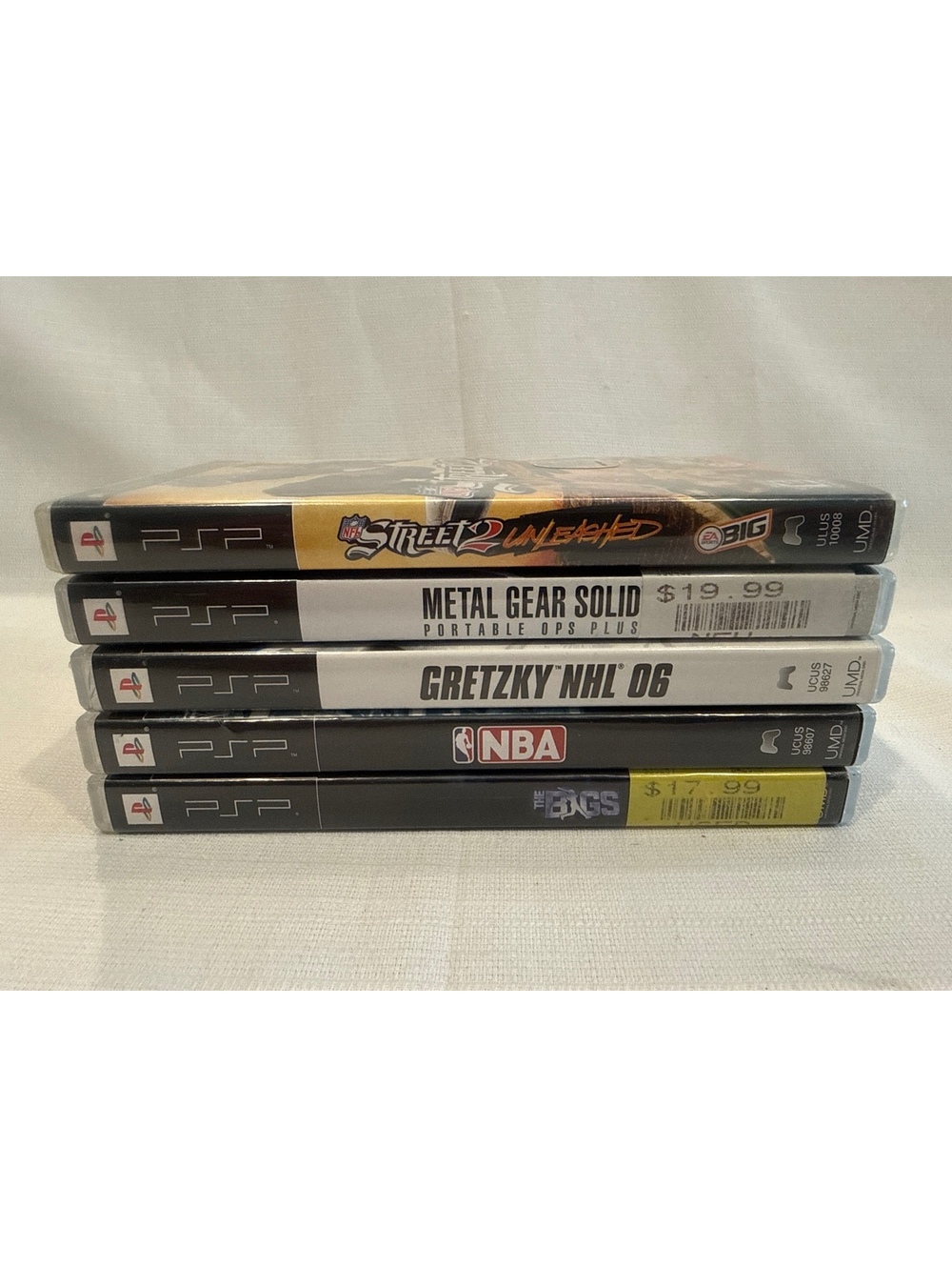 PSP Game Bundle - NFL Street 2 Unleashed, Metal Gear Solid Portable Ops Plus, &